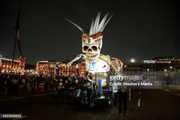 Figures dressed as typical characters of Mexican culture during the 'Day of The Dead Festival' at Zocalo on October 29, 2022 in Mexico City, Mexico.