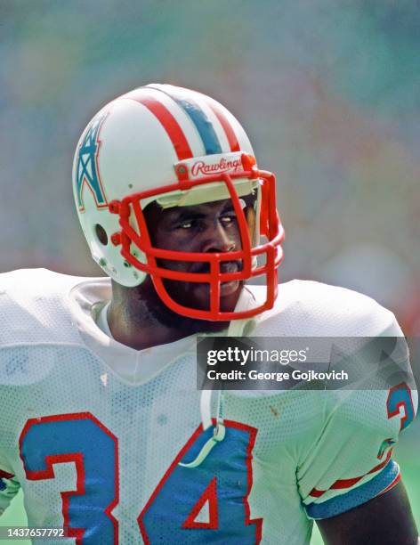 Running back Earl Campbell of the Houston Oilers looks on from the sideline during a game against the Pittsburgh Steelers at Three Rivers Stadium on...