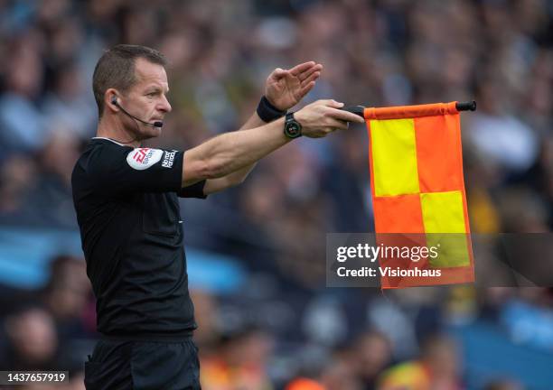 Assistant referee Marc Perry flags for offside during the Premier League match between Manchester City and Brighton & Hove Albion at Etihad Stadium...