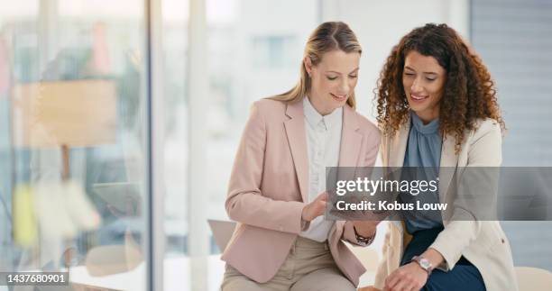 business women, tablet or strategy planning in office, creative london startup or digital marketing company. smile, happy or talking creative designers with technology for brand finance budget review - questionnaire stock pictures, royalty-free photos & images