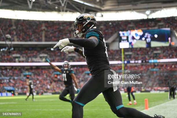 Evan Engram of the Jacksonville Jaguars celebrates scoring their first touchdown during the NFL match between Denver Broncos and Jacksonville Jaguars...