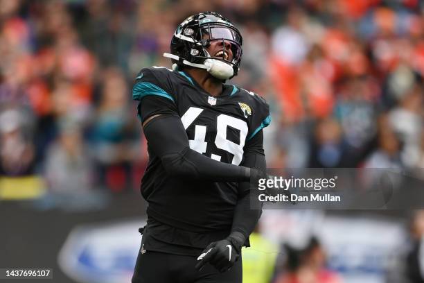 Arden Key of the Jacksonville Jaguars celebrates after sacking Russell Wilson of the Denver Broncos in the first quarter during the NFL match between...