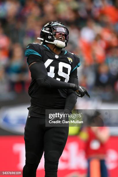 Arden Key of the Jacksonville Jaguars celebrates after sacking Russell Wilson of the Denver Broncos in the first quarter during the NFL match between...