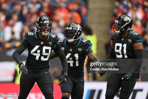 Arden Key of the Jacksonville Jaguars celebrates after sacking Russell Wilson of the Denver Broncos in the first quarter during the NFL match between...