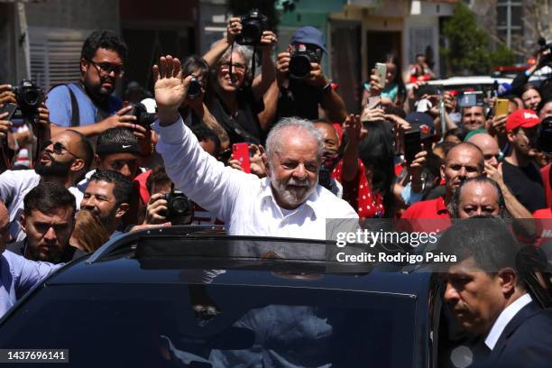 Candidate Luiz Inácio Lula Da Silva of Workers’ Party greets supporters as he leaves Escola Estadual Firmino Correia De Araújo after casting his vote...