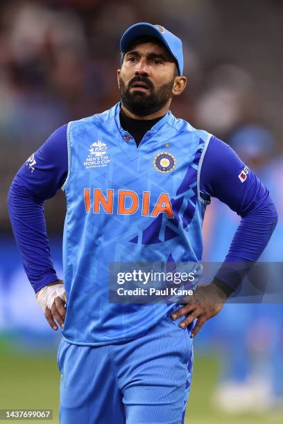Dinesh Karthik of India leaves the field in with an injury during the ICC Men's T20 World Cup match between India and South Africa at Perth Stadium...