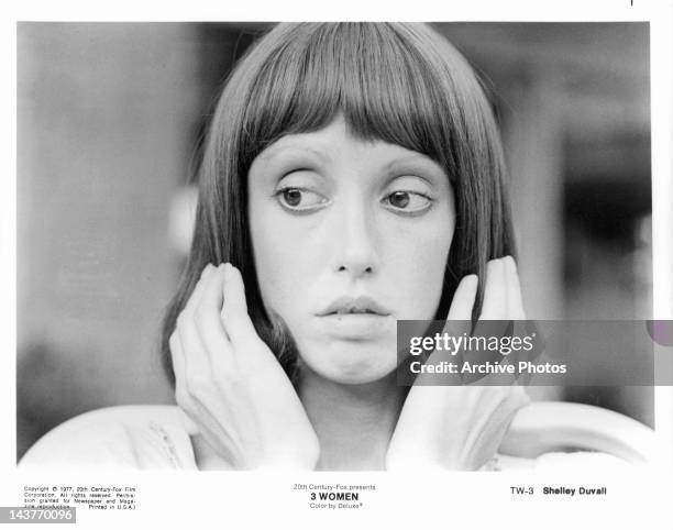 Shelley Duvall with hands to hair in a scene from the film '3 Women', 1977.