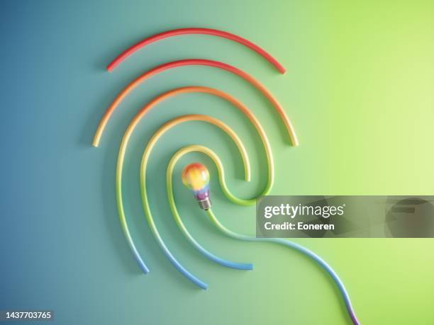 multi colored fingerprint with glowing lightbulb - digital fingerprint stock pictures, royalty-free photos & images