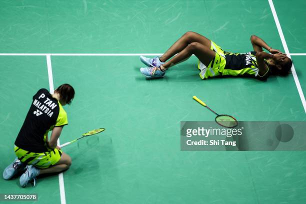 Pearly Tan and Thinaah Muralitharan of Malaysia celebrate the victory in the Women's Double Final match against Mayu Matsumoto and Wakana Nagahara of...