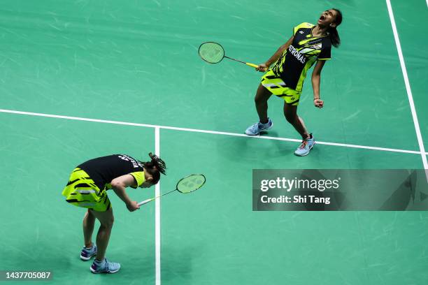 Pearly Tan and Thinaah Muralitharan of Malaysia celebrate the victory in the Women's Double Final match against Mayu Matsumoto and Wakana Nagahara of...