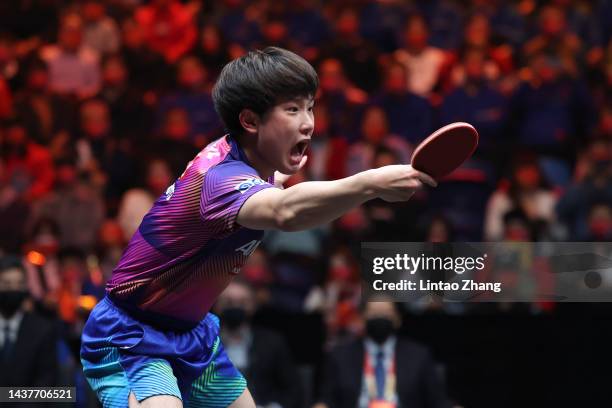 Tomokazu Harimoto of Japan competes against Wang Chuqin of China during the Men's Singles final on day four of the WTT Cup Finals Xinxiang 2022 at...