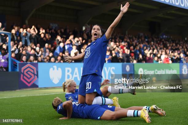 Lauren James of Chelsea celebrates with teammates Pernille Harder and Sam Kerr after scoring her team's second goal during the FA Women's Super...