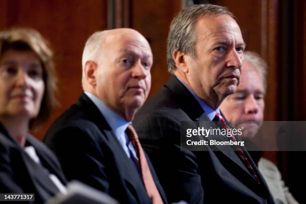 Lawrence "Larry" Summers, professor at the John F. Kennedy School of Government and former director of the U.S. National Economic Council, right, and...