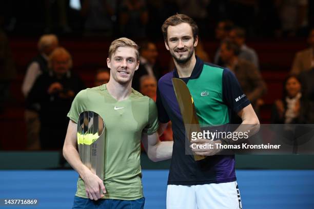 Second placed Denis Shapovalov of Canada and winner Daniil Medvedev of Russia pose after their final match during day nine of the Erste Bank Open...