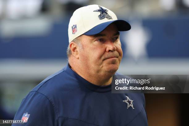 Head coach Mike McCarthy of the Dallas Cowboys walk off the field during warm ups at AT&T Stadium on October 30, 2022 in Arlington, Texas.