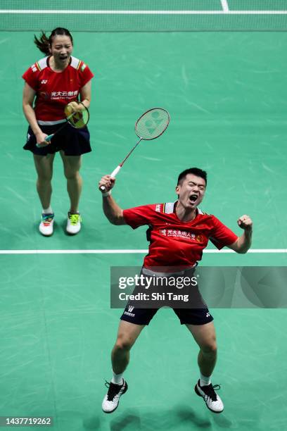 Zheng Siwei and Huang Yaqiong of China celebrate the victory in the Mixed Double Final match against Robin Tabeling and Selena Piek of the...