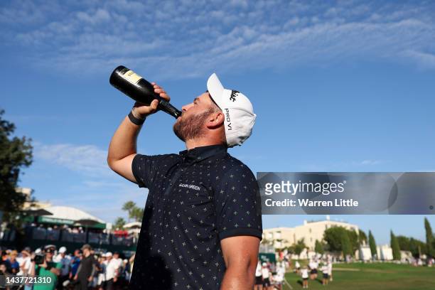 Jordan Smith of England celebrates after winning the Portugal Masters during Day Four of the Portugal Masters at Dom Pedro Victoria Golf Course on...