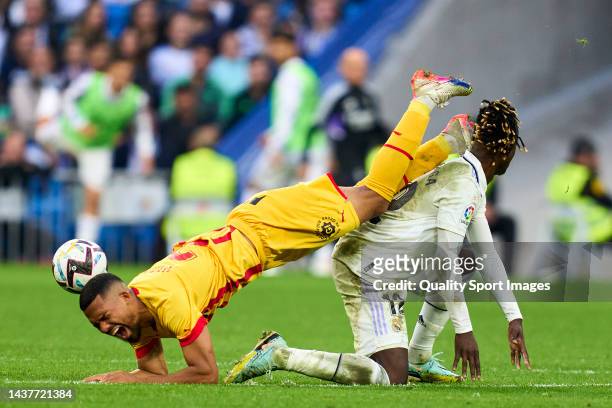 Eduardo Camavinga of Real Madrid battles for the ball with Yangel Herrera of Girona CF during the LaLiga Santander match between Real Madrid CF and...