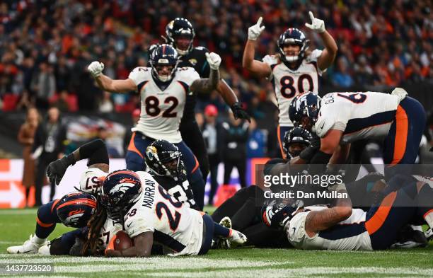 Latavius Murray of the Denver Broncos scores a touchdown during the fourth quarter in the NFL match between Denver Broncos and Jacksonville Jaguars...