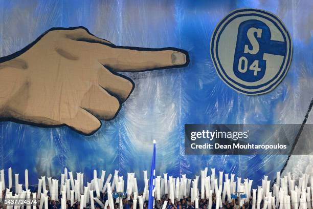 Schalke 04 fans show their support prior to the Bundesliga match between FC Schalke 04 and Sport-Club Freiburg at Veltins-Arena on October 30, 2022...