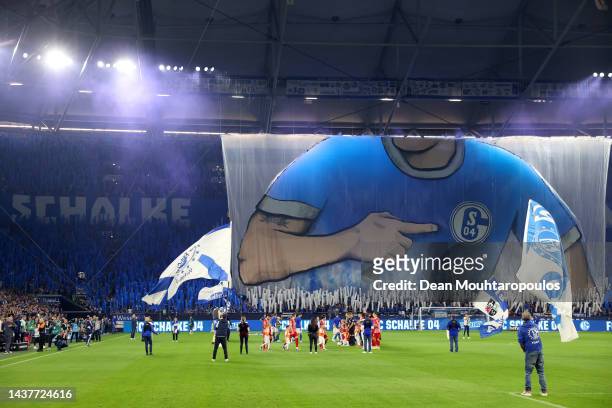 General view inside the stadium as FC Schalke 04 fans show their support prior to the Bundesliga match between FC Schalke 04 and Sport-Club Freiburg...