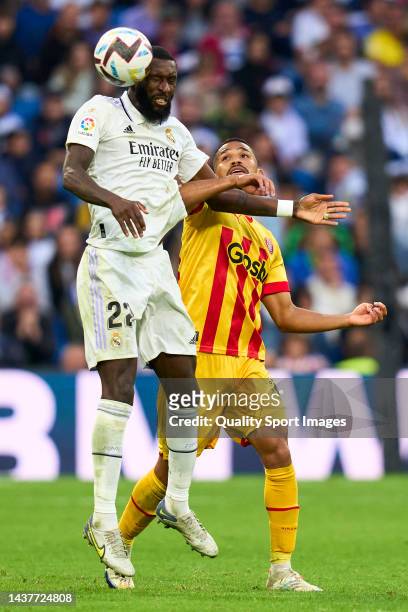 Antonio Rudiger of Real Madrid battle for the ball with Yangel Herrera of Girona CF during the LaLiga Santander match between Real Madrid CF and...