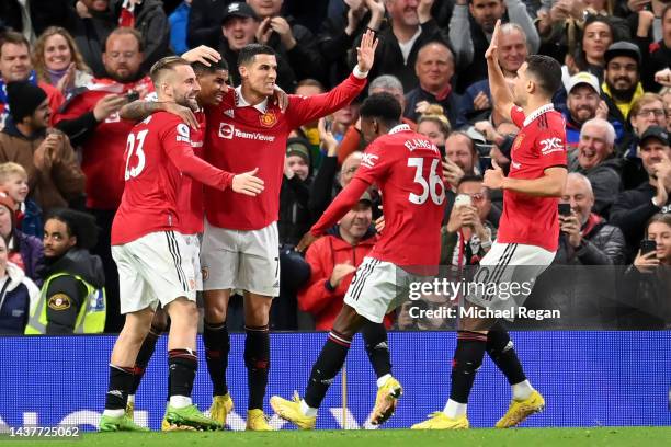 Marcus Rashford of Manchester United celebrates with Cristiano Ronaldo, Luke Shaw, Anthony Elanga and Diogo Dalot after scoring their team's first...