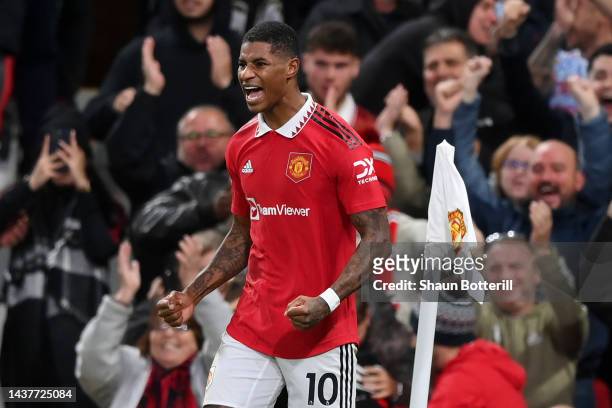 Marcus Rashford of Manchester United celebrates after scoring their team's first goal during the Premier League match between Manchester United and...