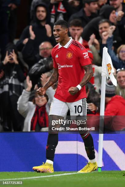 Marcus Rashford of Manchester United celebrates after scoring their team's first goal during the Premier League match between Manchester United and...