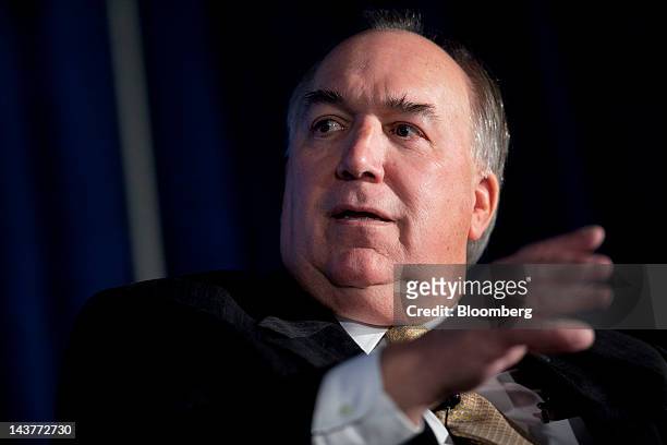 John Engler, president of the Business Roundtable, speaks at the Brookings Institution's Hamilton Project economic forum on taxes in Washington,...