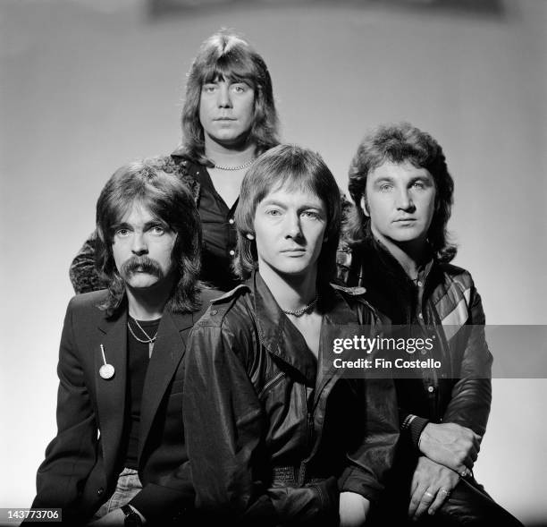 English group Smokie posed in London in July 1980. Left to right: drummer Pete Spencer, lead guitarist Alan Silson, vocalist and guitarist Chris...