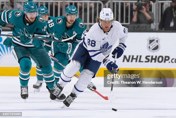 William Nylander of the Toronto Maple Leafs skates with the puck against the San Jose Sharks during the first period of an NHL hockey game at SAP...