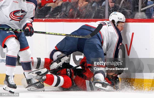 Yegor Sharangovich New Jersey Devils Unsigned White Skating vs. York Islanders Photograph