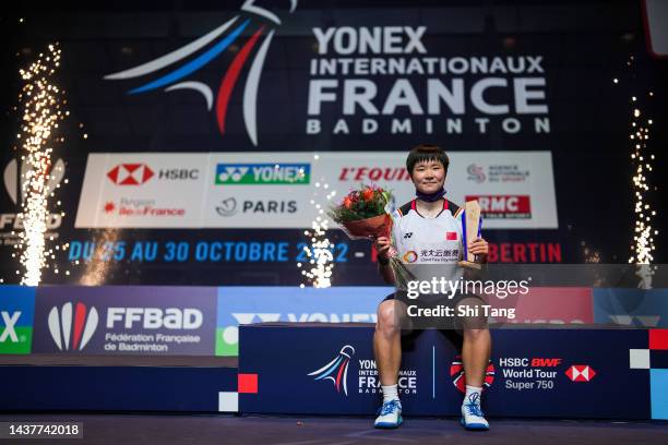 He Bingjiao of China poses with her trophy on the podium after the Women's Single Final match against Carolina Marin of Spain during day six of the...