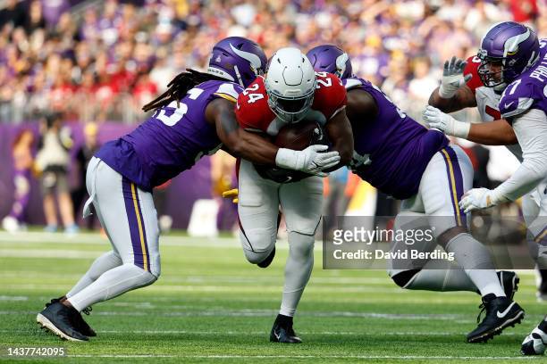 Darrel Williams of the Arizona Cardinals is tackled by Za'Darius Smith of the Minnesota Vikings and Dalvin Tomlinson during the second quarter at...