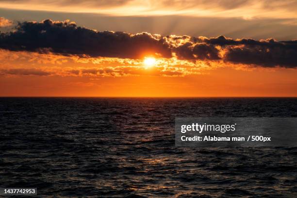 scenic view of sea against sky during sunset,novaya zemlya rayon,arkhangelsk oblast,russia - novaya stock pictures, royalty-free photos & images