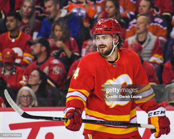 Rasmus Andersson of the Calgary Flames in action against the Edmonton Oilers during an NHL game at Scotiabank Saddledome on October 29, 2022 in...