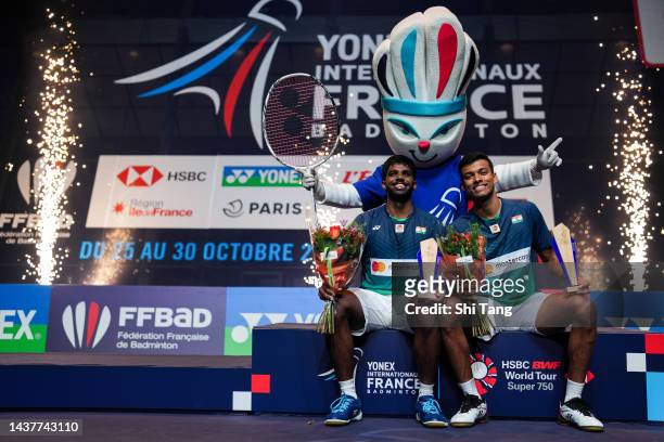 Satwiksairaj Rankireddy and Chirag Shetty of India pose with their trophies on the podium after the Men's Double Final match against Lu Ching Yao and...