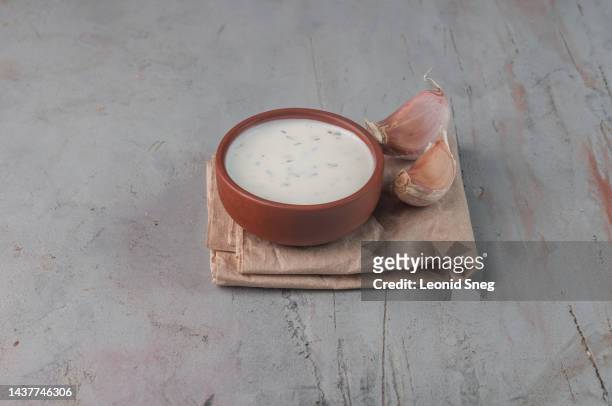 creamy garlic sauce on gray background - aioli bildbanksfoton och bilder