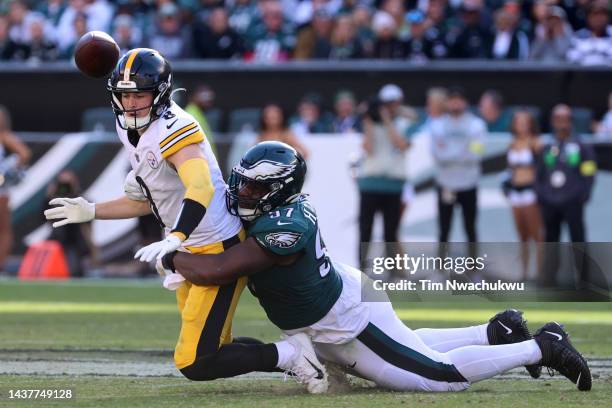 Kenny Pickett of the Pittsburgh Steelers fumbles the ball as he gets sacked by Javon Hargrave of the Philadelphia Eagles in the fourth quarter at...