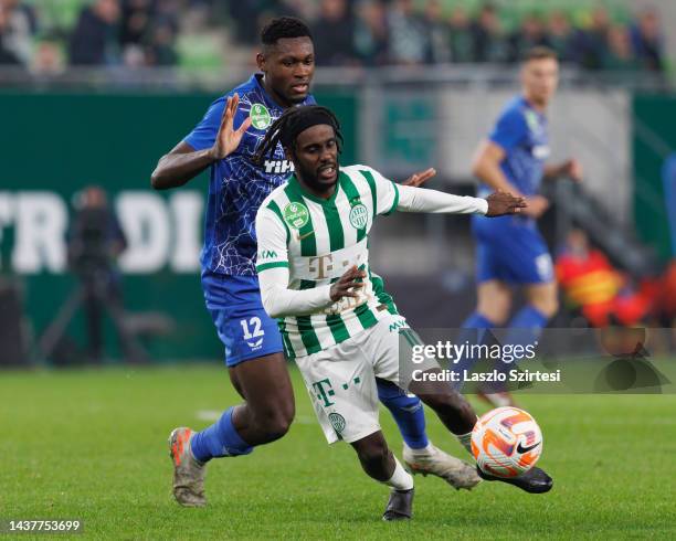 Eduvie Ikoba of ZTE FC fouls Tokmac Chol Nguen of Ferencvarosi TC during the Hungarian OTP Bank Liga match between Ferencvarosi TC and ZTE FC at...