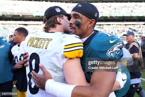 Kenny Pickett of the Pittsburgh Steelers and Jalen Hurts of the Philadelphia Eagles meet at mid-field after the game at Lincoln Financial Field on...