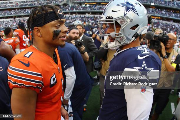 Dak Prescott of the Dallas Cowboys and Justin Fields of the Chicago Bears talk after at AT&T Stadium on October 30, 2022 in Arlington, Texas.