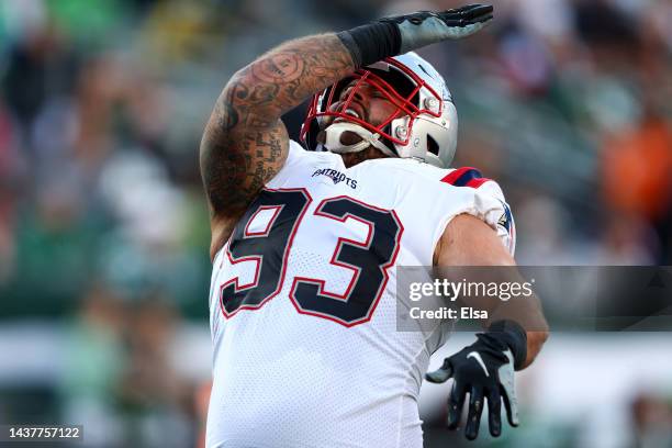 Lawrence Guy of the New England Patriots celebrates a sack during the second half against the New York Jets at MetLife Stadium on October 30, 2022 in...