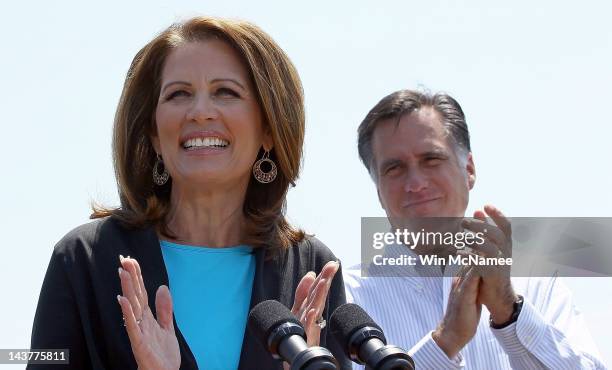 Republican presidential candidate and former Massachusetts Gov. Mitt Romney appears with U.S. Rep. Michele Bachmann during a campaign event at...