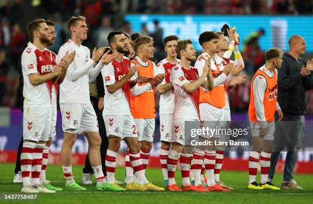 Players of FC Koln applauds fans after following their side's draw in the Bundesliga match between 1. FC Koeln and TSG Hoffenheim at...