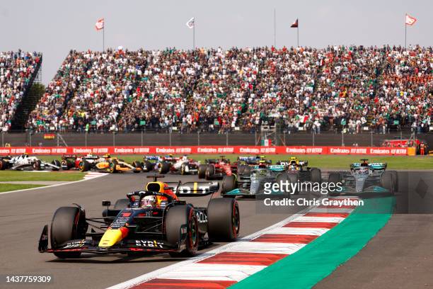 Max Verstappen of the Netherlands driving the Oracle Red Bull Racing RB18 leads George Russell of Great Britain driving the Mercedes AMG Petronas F1...