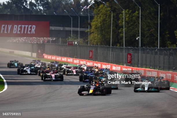 Max Verstappen of the Netherlands driving the Oracle Red Bull Racing RB18 leads George Russell of Great Britain driving the Mercedes AMG Petronas F1...