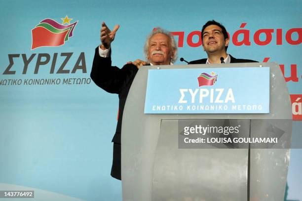 Left Coalition Party leader, Alexis Tsipras and Manolis Glezos a resistance hero, politician and writer greet the crowd prior to a speech during...