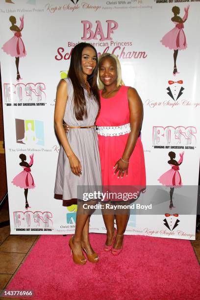 Singer Michelle Williams of Destiny's Child poses for photos with Syreeta Talbert during the BAP School Of Charm's Inaugural High Tea at the Charles...